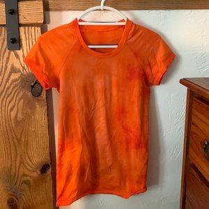 Orange Lululemon razor top